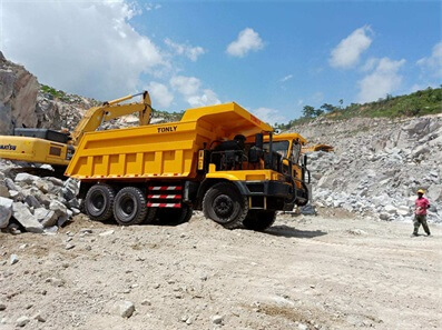 Tonly Mining Dump Trucks working  in Quarry of Côte d'Ivoire